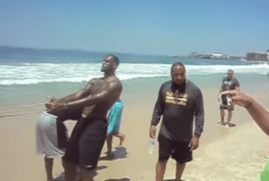 LeBron and the Cavs work out on the beach in Brazil