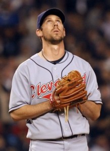 Cleveland Indians starting pitcher Cliff Lee looks up before he pitches to New York Yankees batter Hideki Matsui with two runners on base, two out, and a 3-0 lead in the sixth inning of their MLB American League baseball game at Yankee Stadium in New York May 7, 2008. Lee struck out Matsui to end the inning. REUTERS/Ray Stubblebine  (UNITED STATES)